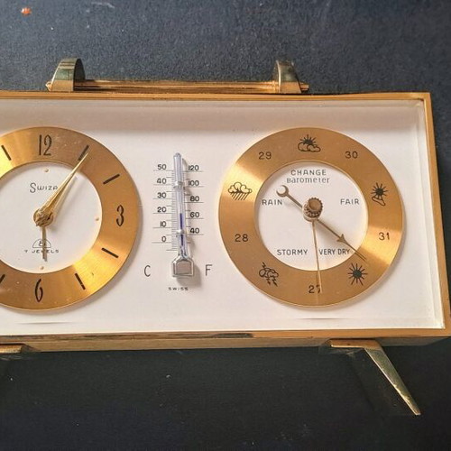 Swiza clock alarm with thermometer and barometer like new