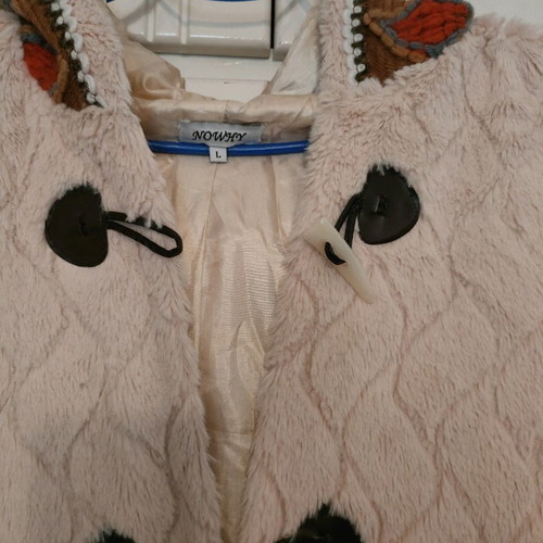 Fur vest used, pale pink with ethnic details, size L