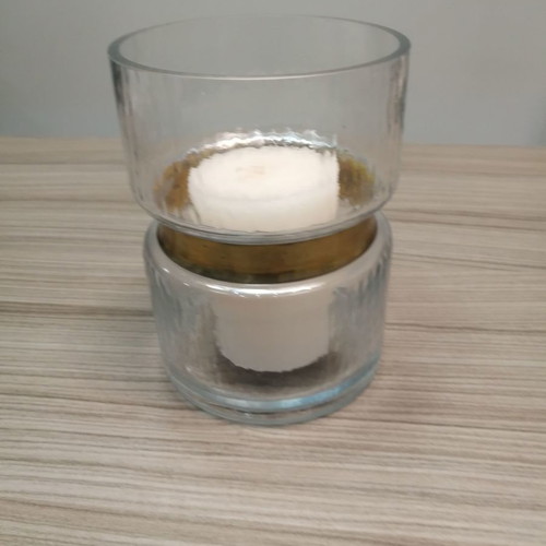 Decorative glass candle holder vase used with gold design