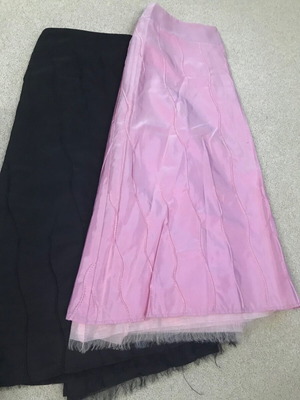 Two women's midi skirts used, black Avant size 42 and pink