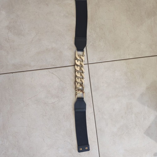 Celestino women's elastic belt with gold detail like new, adjustable size, black
