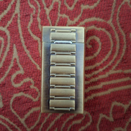 Vintage lighter with integrated quartz watch used
