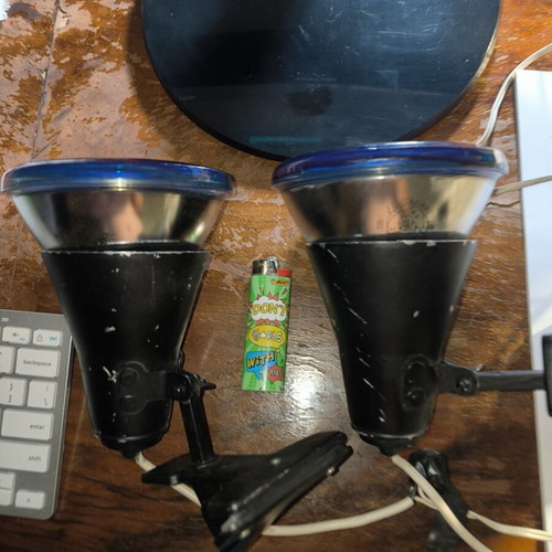 Iron spotlights with blue incandescent bulbs used, retro style