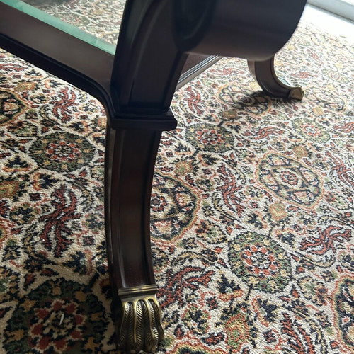Coffee table like new walnut wood with brass lion legs and glass top