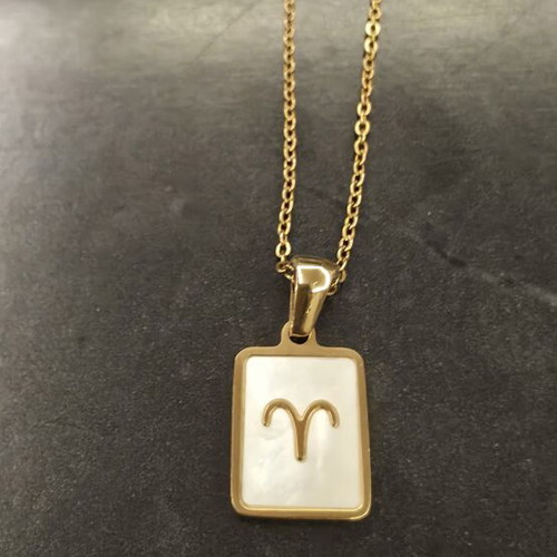 Necklace made of stainless steel like new, gold color with white Aries zodiac
