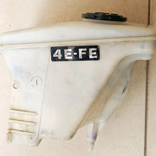Toyota 4E-FE windshield washer water reservoir used with mechanism