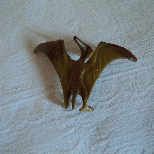Small action figures used, approx. 8cm, including Power Rangers and Archaeopteryx