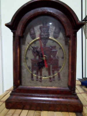Ethnic tabletop clock used with African figures
