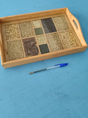 Decorative tray with glass and real legumes like new