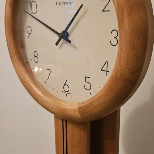 Hermle wall clock with pendulum like new, solid wood
