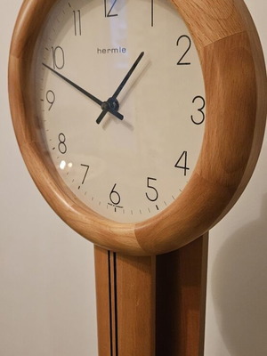 Hermle wall clock with pendulum like new, solid wood