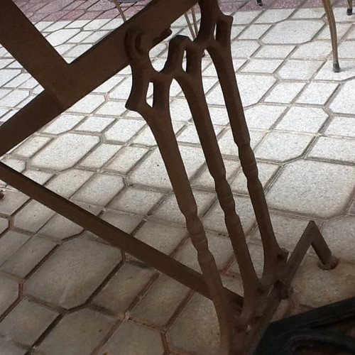 CAST IRON TABLE WITH STONE SURFACE-