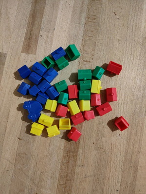 Plastic house tokens used, pack