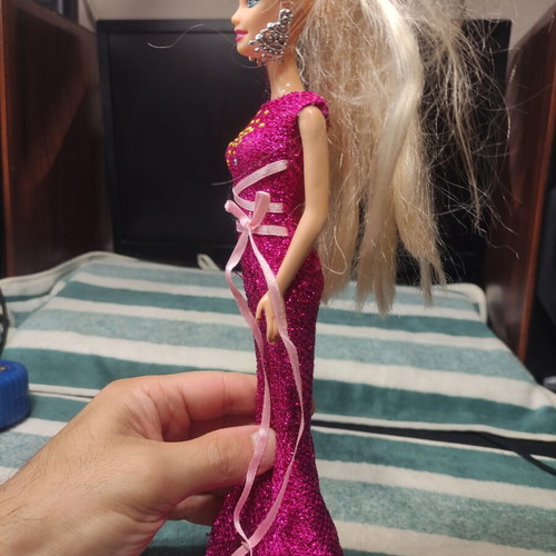 Doll with formal dress used, good condition