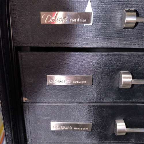 Professional makeup case used, large size with wheels and clips