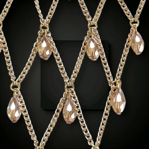 Garter new with gold chains and large crystals