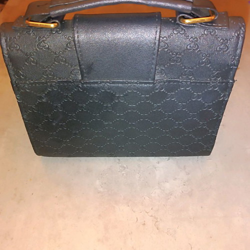 Handbag like new black with metal decoration