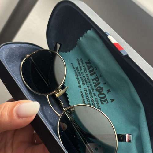 Tommy Hilfiger sunglasses with gold frame and dark lenses