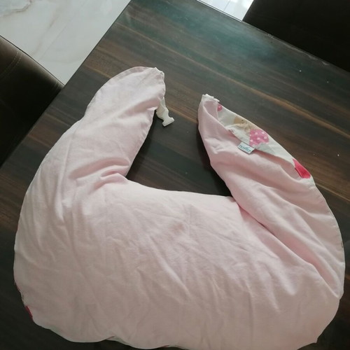 Nursing pillow used with washable cover anatomical