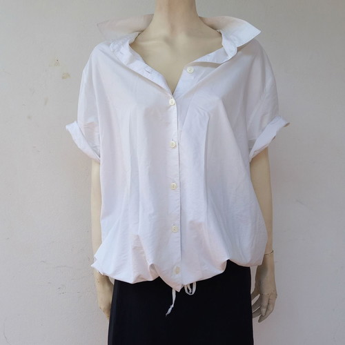 Oversize white shirt used with drawstring detail