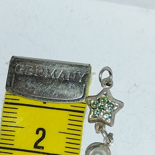 Silver charm pendant like new, turquoise and silver