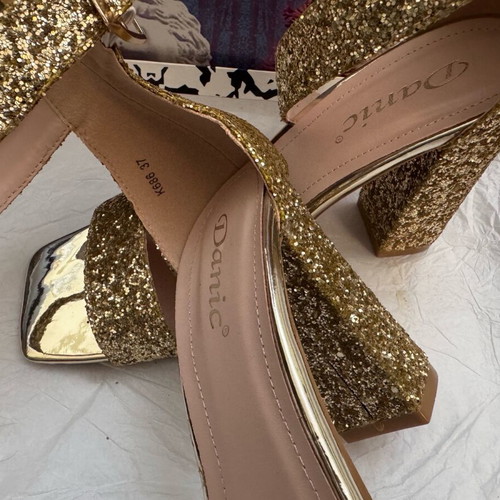 Danic No 37 heels used, gold color in very good condition
