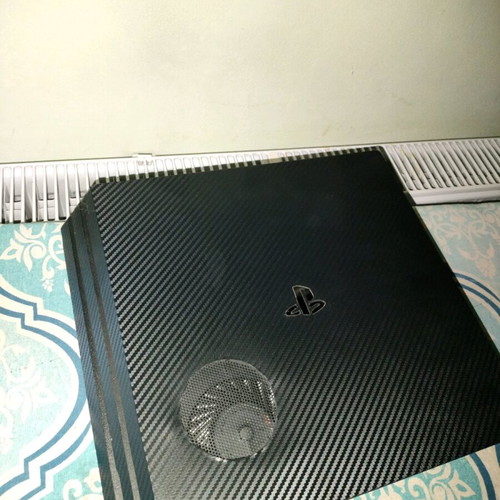 PlayStation 4 Pro like new with 500GB SSD and carbon skin