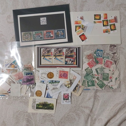 Large lot with FDC, ETB, postcards, traveled covers, stamps, folios used