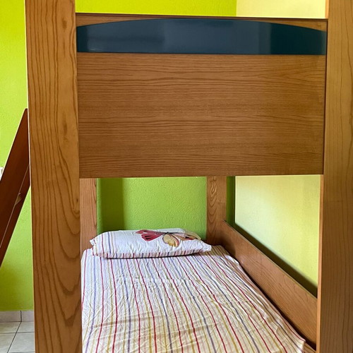 Wooden bunk bed with third sliding bed and mattresses like new