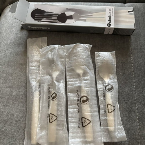 Tupperware cutlery set with white handles, new