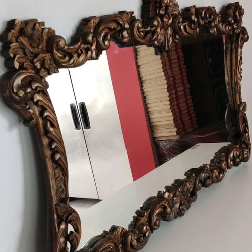 Very old carved wooden mirror like new