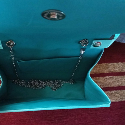 Satin bag unused with strap and chain turquoise