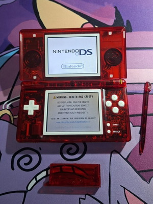 Nintendo DS Lite transparent red like new with stylus and protective cover