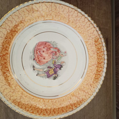 Vintage decorative plate with romantic couple and orange marble border used
