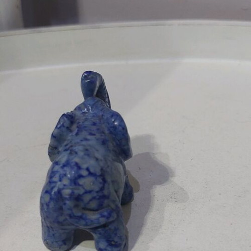 Decorative elephant carved from natural blue stone like new