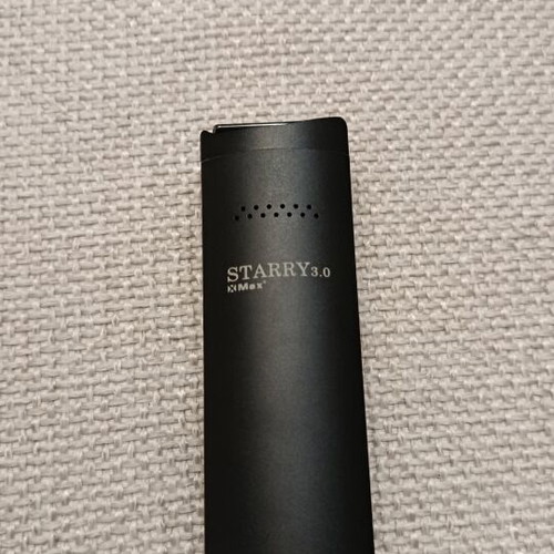 XMax Starry 3.0 vaporizer used with charging cable