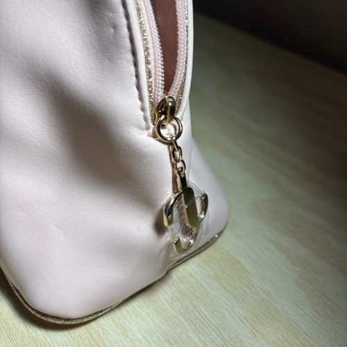 Jimmy Choo toiletry bag new, beige