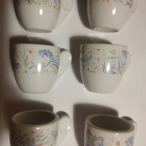 Loumides set of 8 cups with 8 saucers like new