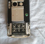Sony Ericsson mobile phone used, missing back cover