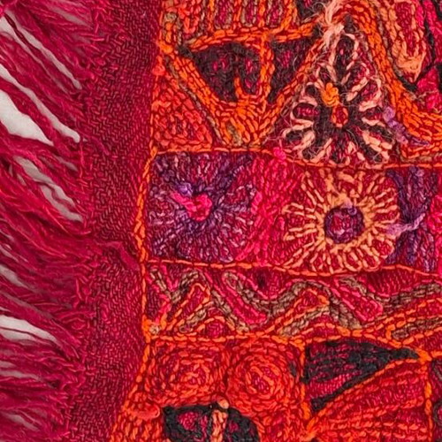 Handmade woven cover like new in red shades