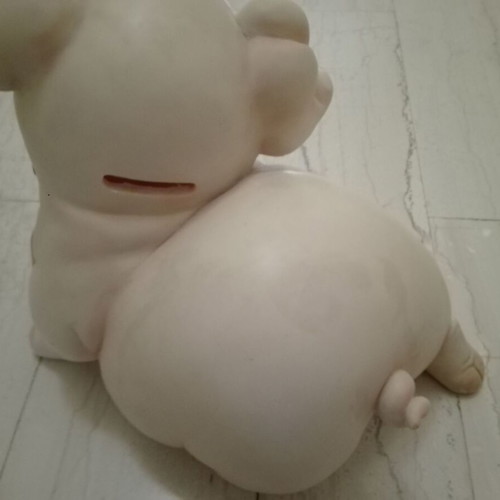 Piggy bank vintage used with gold coins