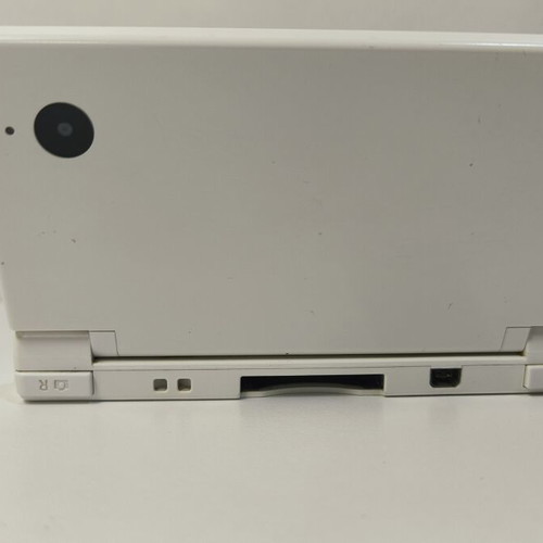 Nintendo DSi white console with 10 games and stylus used