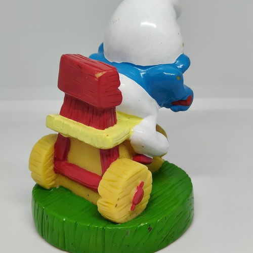 Smurf collectible figure on bicycle handmade Peyo like new