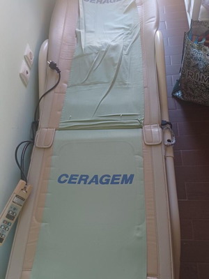 Ceragem Master M3500 thermal massage bed used with remote control