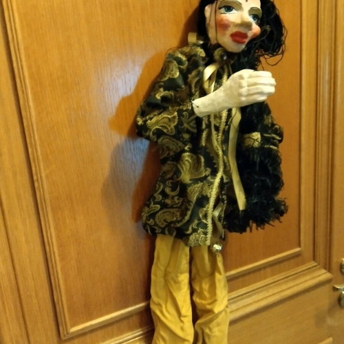 Handmade doll like new with amazing clothes hanging
