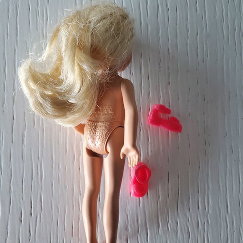 Barbie girl with her shoes used