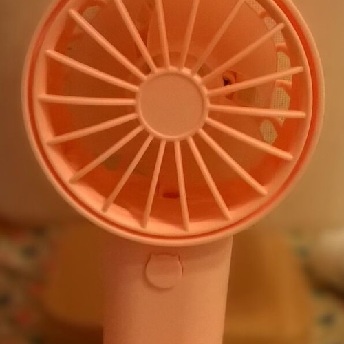 Pink Mini Fan like new with stable base, battery operated