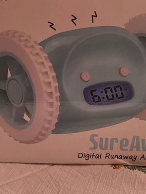 Digital Runaway Alarm Clock tabletop new that moves on wheels