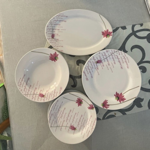 Dinnerware set like new, 6 large, 5 deep, 6 small plates and a platter