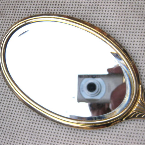 Hand mirror used, enamel and bijouterie